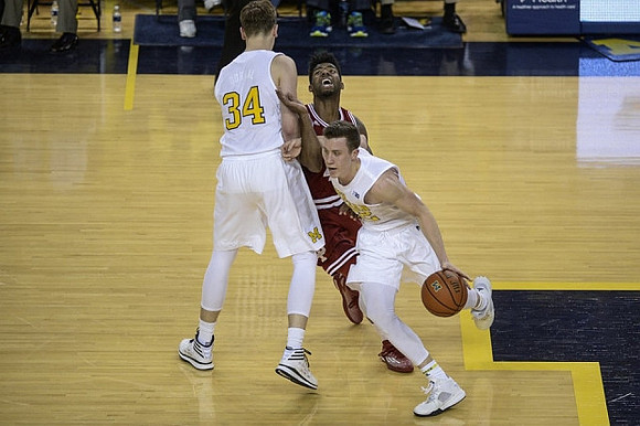 Mark Donnal (34) and Duncan Robinson (22)