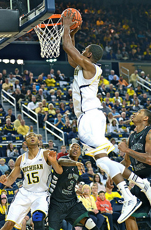 Jon Horford (15) and Glenn Robinson III (1)