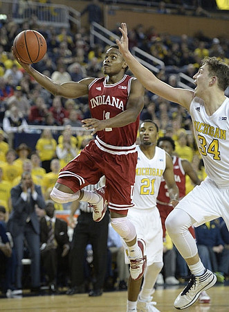 Zak Irvin (21) and Mark Donnal (34)