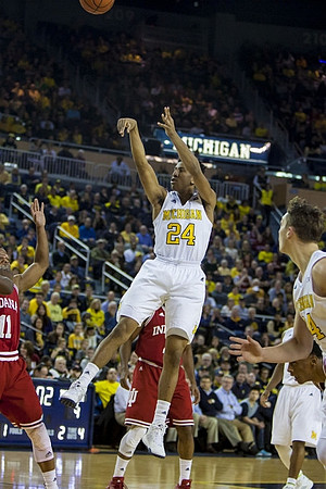 Aubrey Dawkins (24) and Mark Donnal (34)