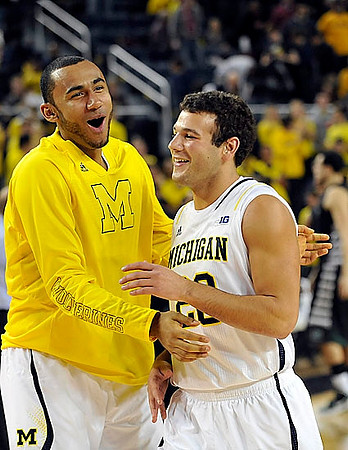 Jon Horford (15) and Josh Bartelstein (20)