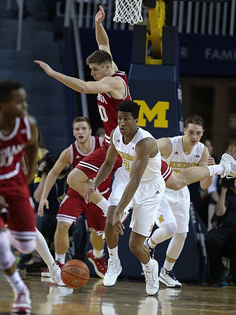Aubrey Dawkins (24) and Mark Donnal (34)