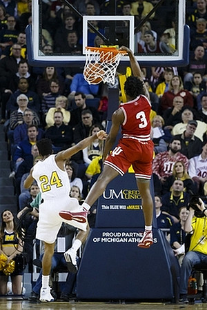 Derrick Walton Jr. (10) and Mark Donnal (34)