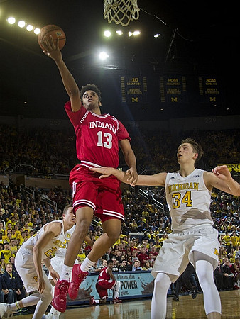 Duncan Robinson (22) and Mark Donnal (34)