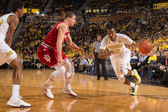 Zak Irvin (21) and Aubrey Dawkins (24)