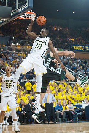 Jordan Morgan (52) and Tim Hardaway Jr. (10)