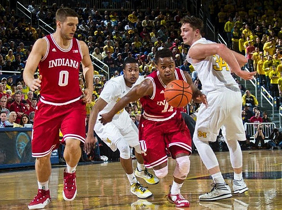Muhammad-Ali Abdur-Rahkman (12) and Mark Donnal (34)