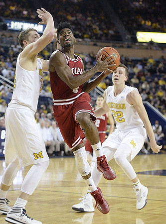 Mark Donnal (34) and Duncan Robinson (22)