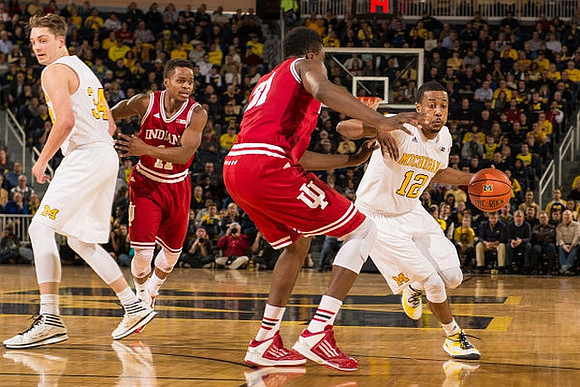Aubrey Dawkins (24) and Derrick Walton Jr. (10)