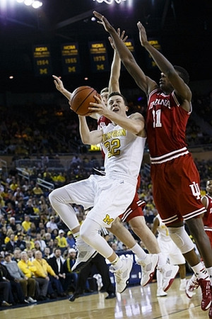 Mark Donnal (34) and Duncan Robinson (22)