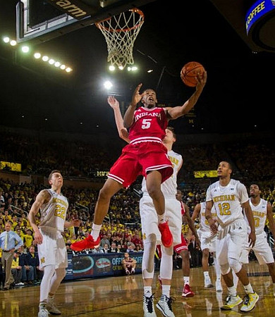Duncan Robinson (22), Mark Donnal (34), Muhammad-Ali Abdur-Rahkman (12), and Derrick Walton Jr. (10)