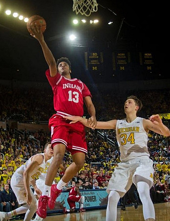 Duncan Robinson (22) and Mark Donnal (34)