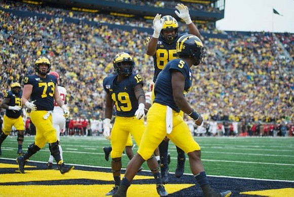 Cesar Ruiz (51), Jalen Mayfield (73), Mike Sainristil (19), Mustapha Muhammad (85), and Joe Milton (5)