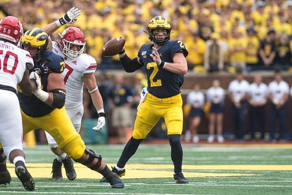 Ben Bredeson (74) and Shea Patterson (2)