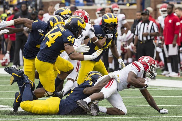 Khaleke Hudson (7), Cameron McGrone (44), Michael Danna (4), and Lavert Hill (24)