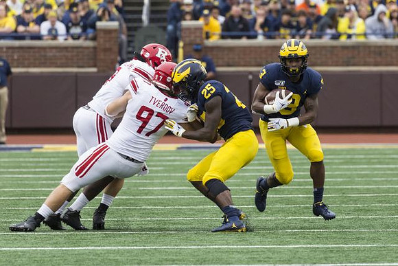 Hassan Haskins (25) and Christian Turner (3)