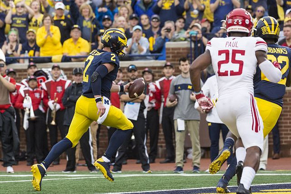 Shea Patterson (2) and Nick Eubanks (82)