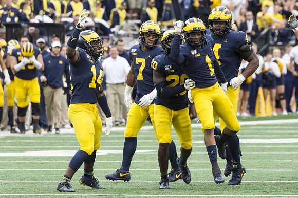 Josh Metellus (14), Khaleke Hudson (7), Brad Hawkins (20), Ambry Thomas (1), and Michael Danna (4)