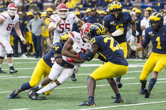 Josh Metellus (14), Brad Hawkins (20), Josh Uche (6), and Ambry Thomas (1)