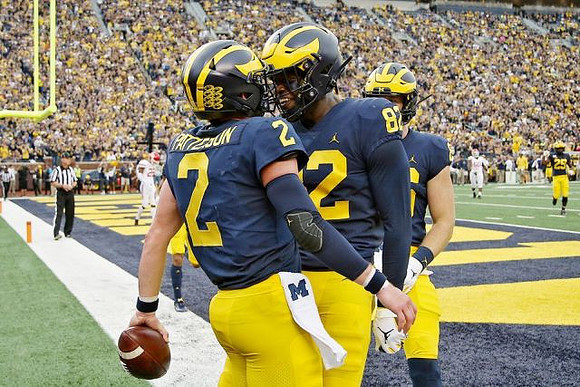 Shea Patterson (2) and Nick Eubanks (82)