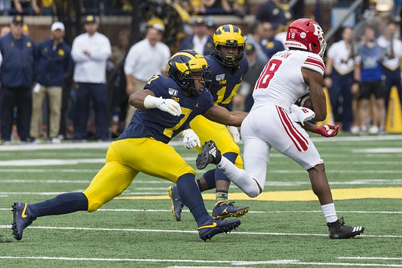 Khaleke Hudson (7) and Josh Metellus (14)