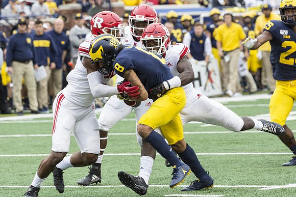 Ronnie Bell (8) and Hassan Haskins (25)