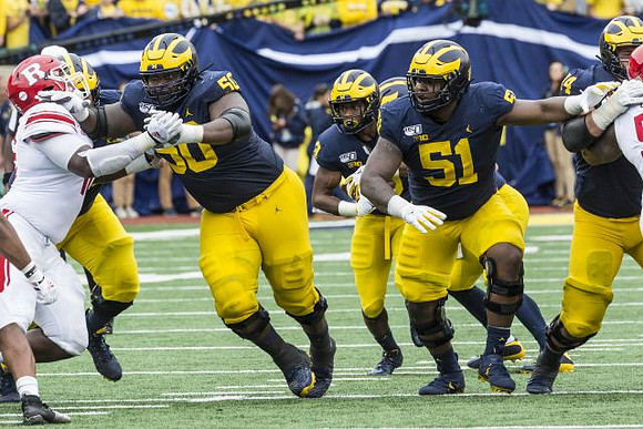 Michael Onwenu (50), Christian Turner (3), Cesar Ruiz (51), and Ben Bredeson (74)