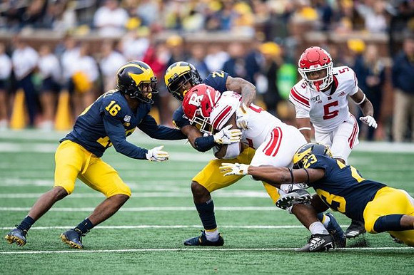 Jaylen Kelly-Powell (16), Brad Hawkins (20), and Michael Barrett (23)