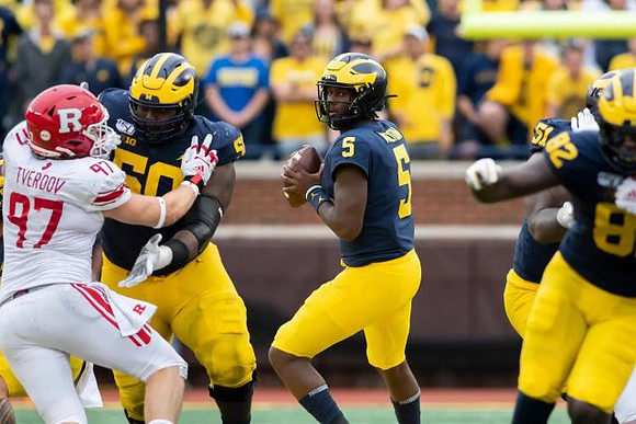 Michael Onwenu (50), Joe Milton (5), Cesar Ruiz (51), and Nick Eubanks (82)