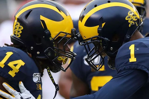 Josh Metellus (14) and Ambry Thomas (1)