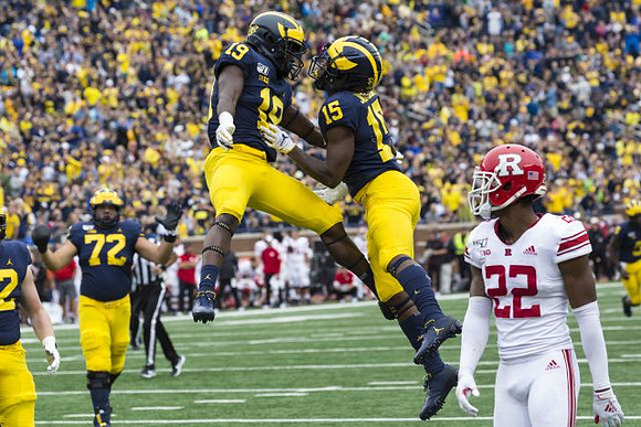 Stephen Spanellis (72), Mike Sainristil (19), and Giles Jackson (15)