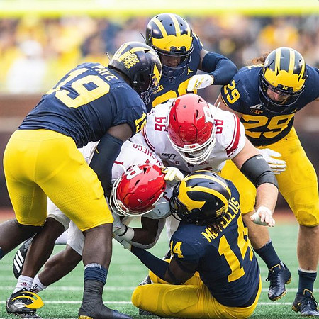 Kwity Paye (19), Josh Metellus (14), and Jordan Glasgow (29)