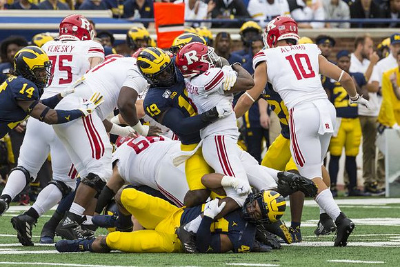 Josh Metellus (14), Kwity Paye (19), and Cameron McGrone (44)