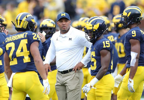 Zach Charbonnet (24), Josh Gattis, Giles Jackson (15), and Donovan Peoples-Jones (9)