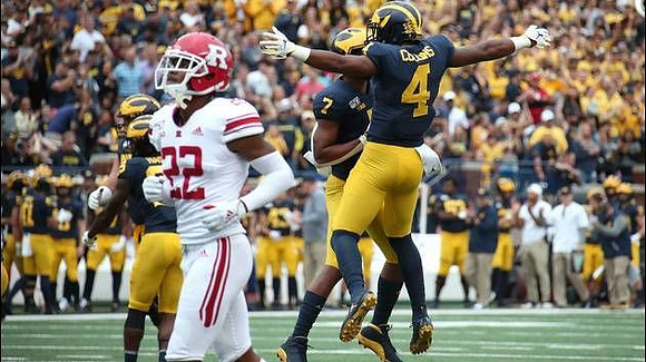 Tarik Black (7) and Nico Collins (4)