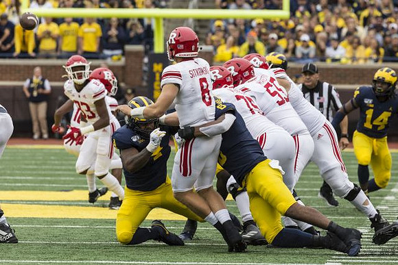 Michael Danna (4), Josh Uche (6), and Josh Metellus (14)