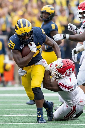 Hassan Haskins (25) and Joe Milton (5)
