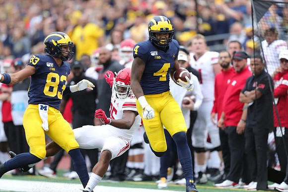 Erick All (83) and Nico Collins (4)