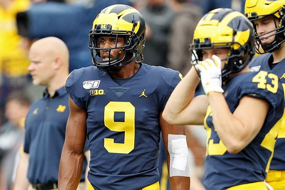 Donovan Peoples-Jones (9) and Jake McCurry (43)