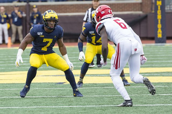 Khaleke Hudson (7) and Josh Metellus (14)