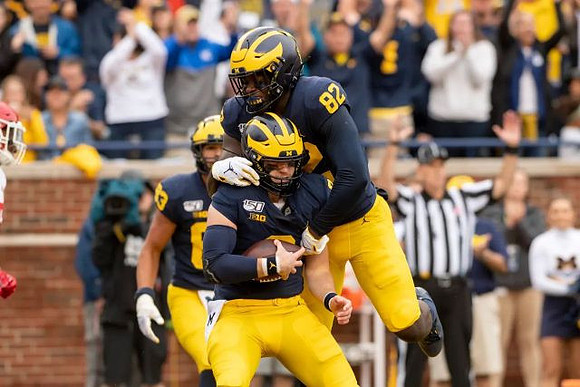 Erick All (83), Shea Patterson (2), and Nick Eubanks (82)