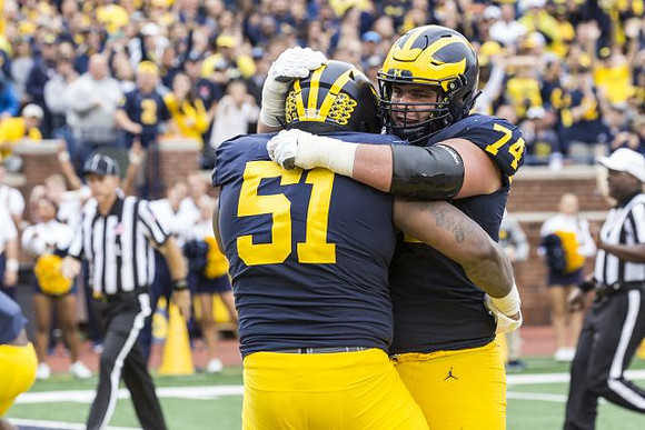 Cesar Ruiz (51) and Ben Bredeson (74)