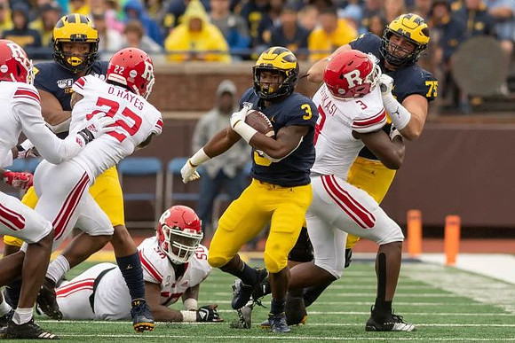 Christian Turner (3) and Jon Runyan Jr. (75)