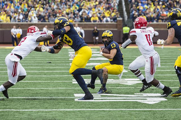 Erick All (83), Tru Wilson (13), and Jalen Mayfield (73)