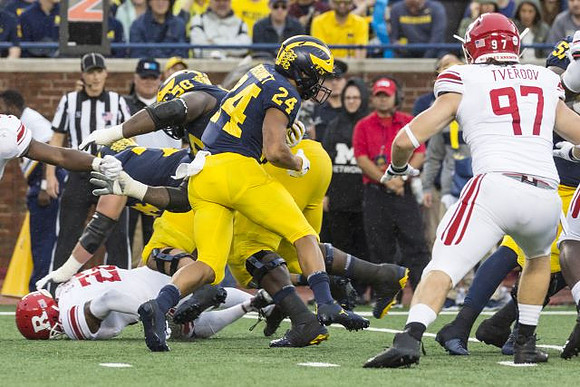 Ben Bredeson (74), Michael Onwenu (50), and Zach Charbonnet (24)
