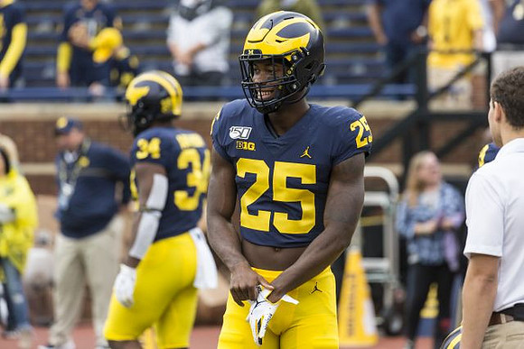 Jordan Anthony (34) and Hassan Haskins (25)