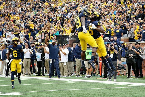 Cornelius Johnson (6), Mike Sainristil (19), and Giles Jackson (15)