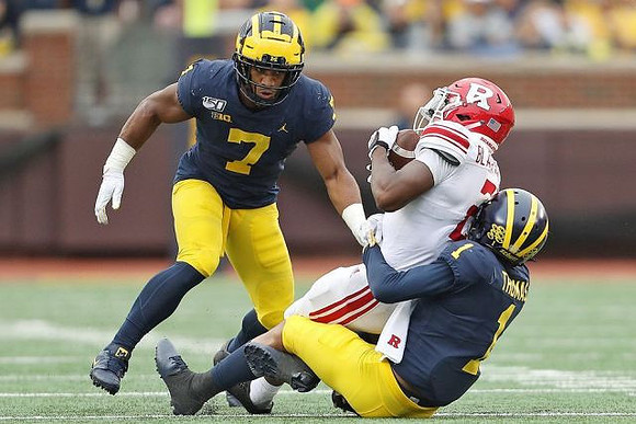Khaleke Hudson (7) and Ambry Thomas (1)