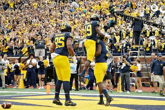 Mustapha Muhammad (85), Mike Sainristil (19), and Joe Milton (5)