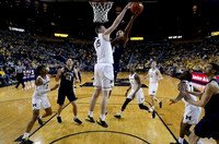 Jordan Poole (2), Jon Teske (15), Charles Matthews (1), Ignas Brazdeikis (13), and Zavier Simpson (3)